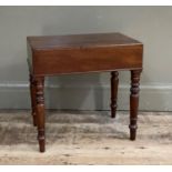 An early 19th century mahogany bidet, the rectangular cover lifting to reveal kidney shaped liner,