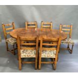 A good quality reproduction oak extending dining table, the oval top with pair of leaves on turned