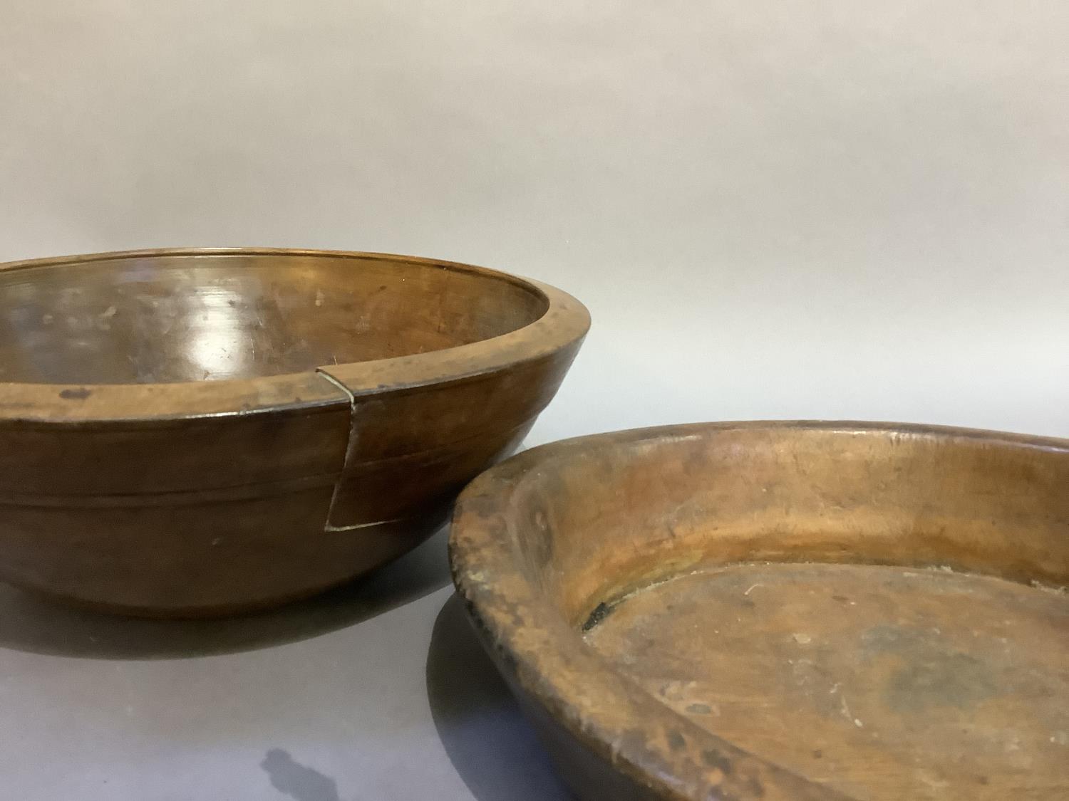 A 19th century circular sycamore bowl, 35cm diameter approx together with another turned wooden bowl - Image 3 of 4