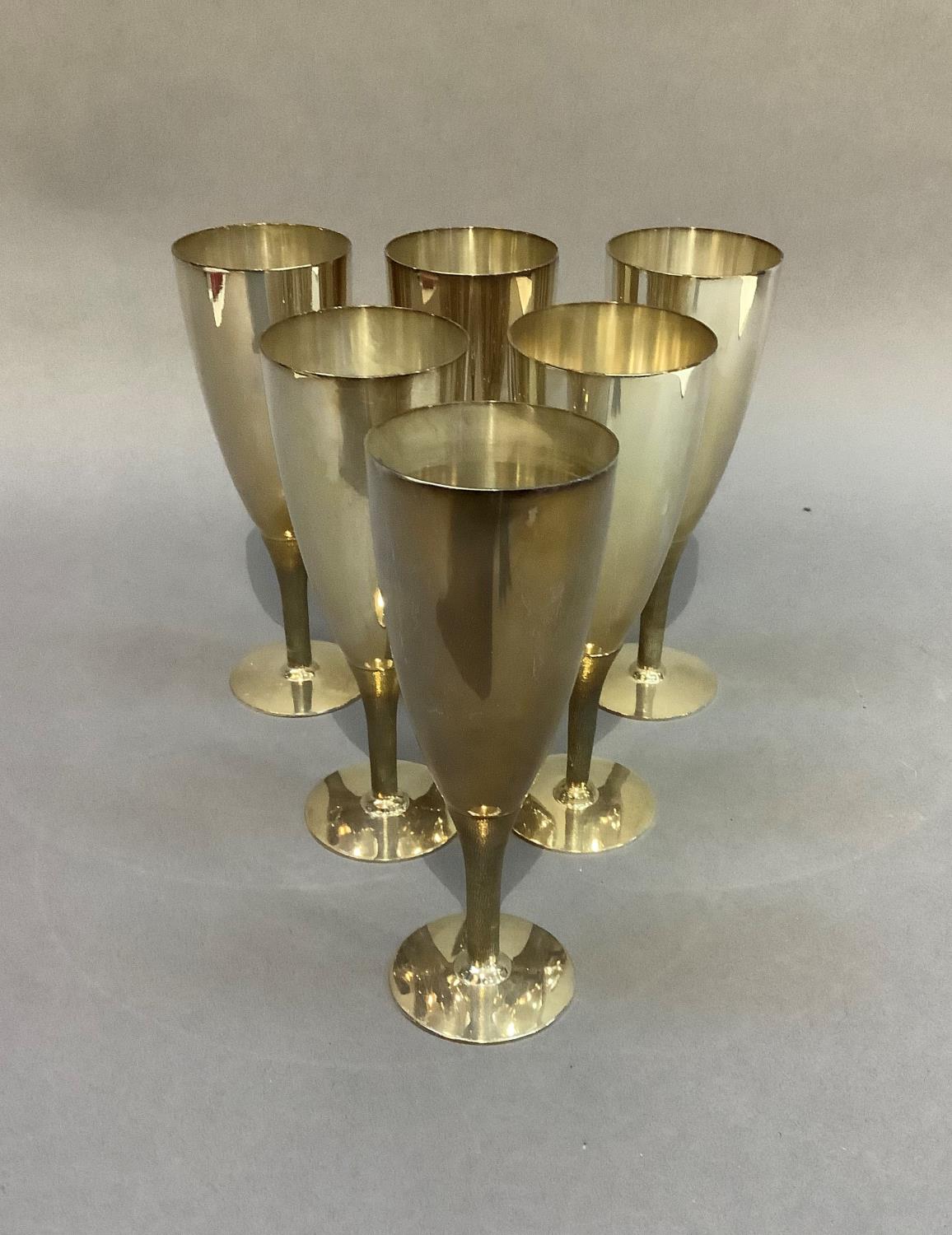 A set of six Mappin & Webb silver plated goblets with textured stems, on circular foot, 17.5cm high