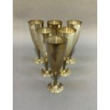 A set of six Mappin & Webb silver plated goblets with textured stems, on circular foot, 17.5cm high