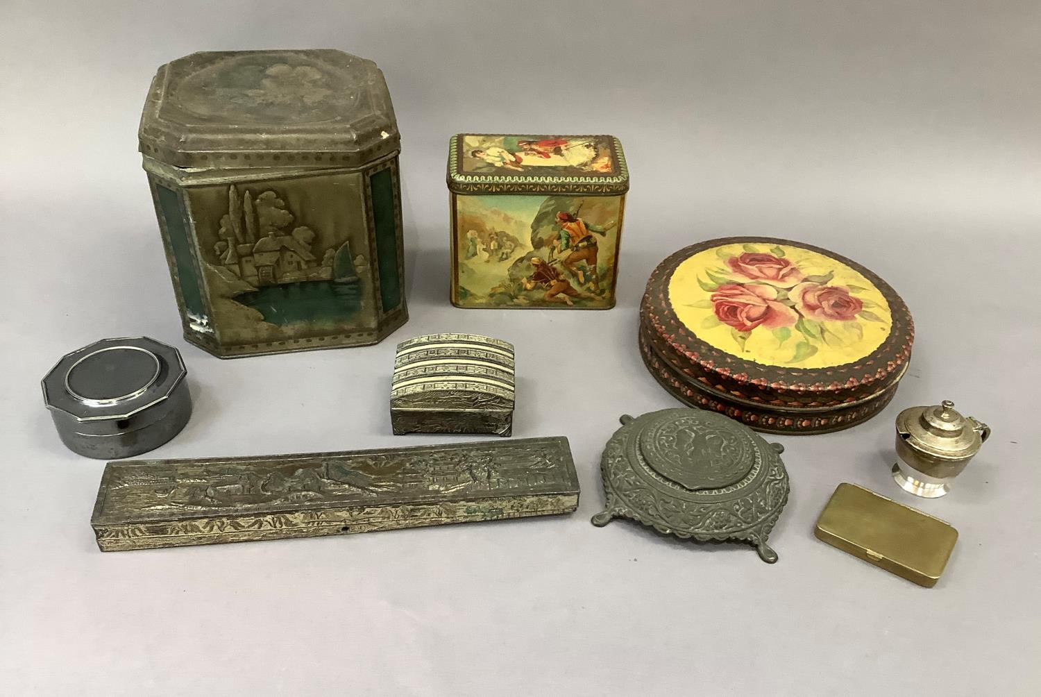 A quantity of vintage tins, white metal and cast iron boxes, silver plated box and cover, brass