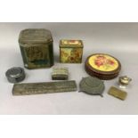 A quantity of vintage tins, white metal and cast iron boxes, silver plated box and cover, brass