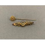 An Edward VII ruby and rose diamond cluster tie pin in 9ct gold together with an Edward VII opal and