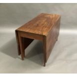 A George III mahogany Pembroke table with pair of deep folding leaves, on moulded square tapered