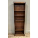 A reproduction mahogany open standing book shelf with adjustable shelves, 57cm wide x 27cm deep x