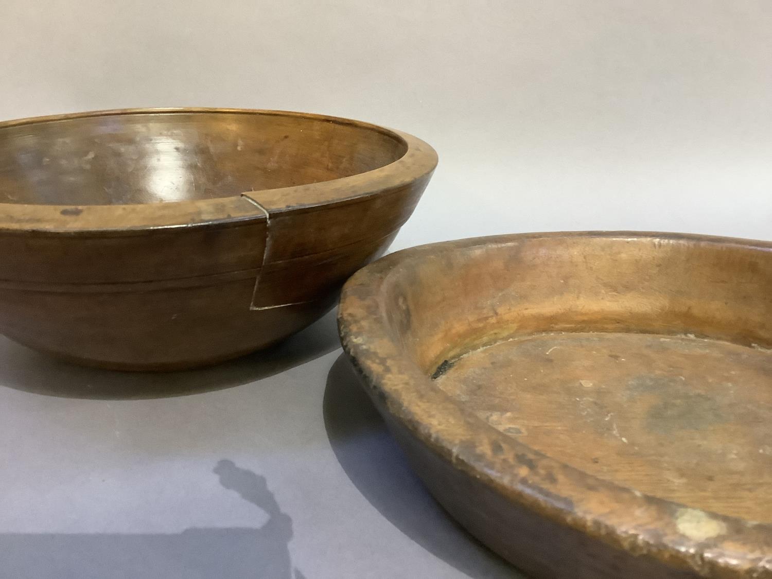 A 19th century circular sycamore bowl, 35cm diameter approx together with another turned wooden bowl - Image 4 of 4