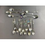 Two silver and enamelled spoons, five marked Sterling silver, a New Zealand paua inset souvenir