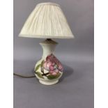 A Moorcroft pottery baluster lamp, pink magnolia, impressed mark initialled E.A, 17cm high with a