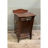 An Edwardian mahogany perdonium with serpentine shaped back rail, the top serpentine framed above