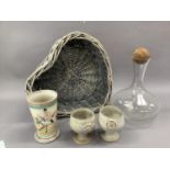 A ships style decanter with spherical wooden stopper, a pair of Gerry Harper pottery goblets and a