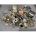 A collection of mid to late 20th century costume jewellery including two compacts, necklaces,