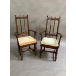 A pair of reproduction elm and beech elbow chairs in late 17th century style, the top rails with