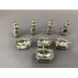 An eleven piece silver cruet Birmingham 1907 comprising four open salts, three spoons, four