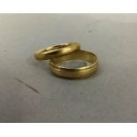 Two 9ct gold wedding rings