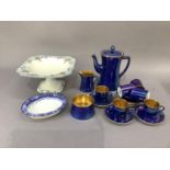 A Carlton ware 15 piece coffee service of blue lustre glaze and gilt interiors comprising coffee