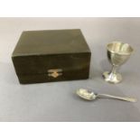 A silver egg cup initialled LGH and spoon, Birmingham 1956