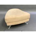 A Rolf Benz upholstered stool, upholstered in beige fabric, on four metal scrolling legs, 86cm