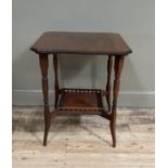 A late Victorian walnut occasional table, the square top with canted corners above ring turned