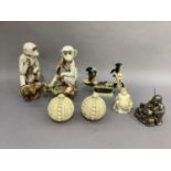 A quantity of reproduction resin and decorative items including pair of monkey figures, Buddhas etc