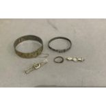 A Scandinavian silver bar brooch together with a Victorian silver bar brooch, two silver bangles and