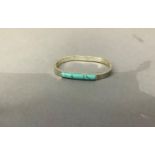 A Mexican silver bangle set with simulated turquoise, total approximate weight 29g