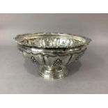 A continental .800 silver fruit bowl on pedestal foot, having a cast rim above shield shaped
