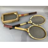 Three tennis racquets and a Slazenger bag