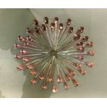 A set of pink glass lustre pendants