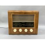 A Bush radio in walnut veneered case with ivorine handles,