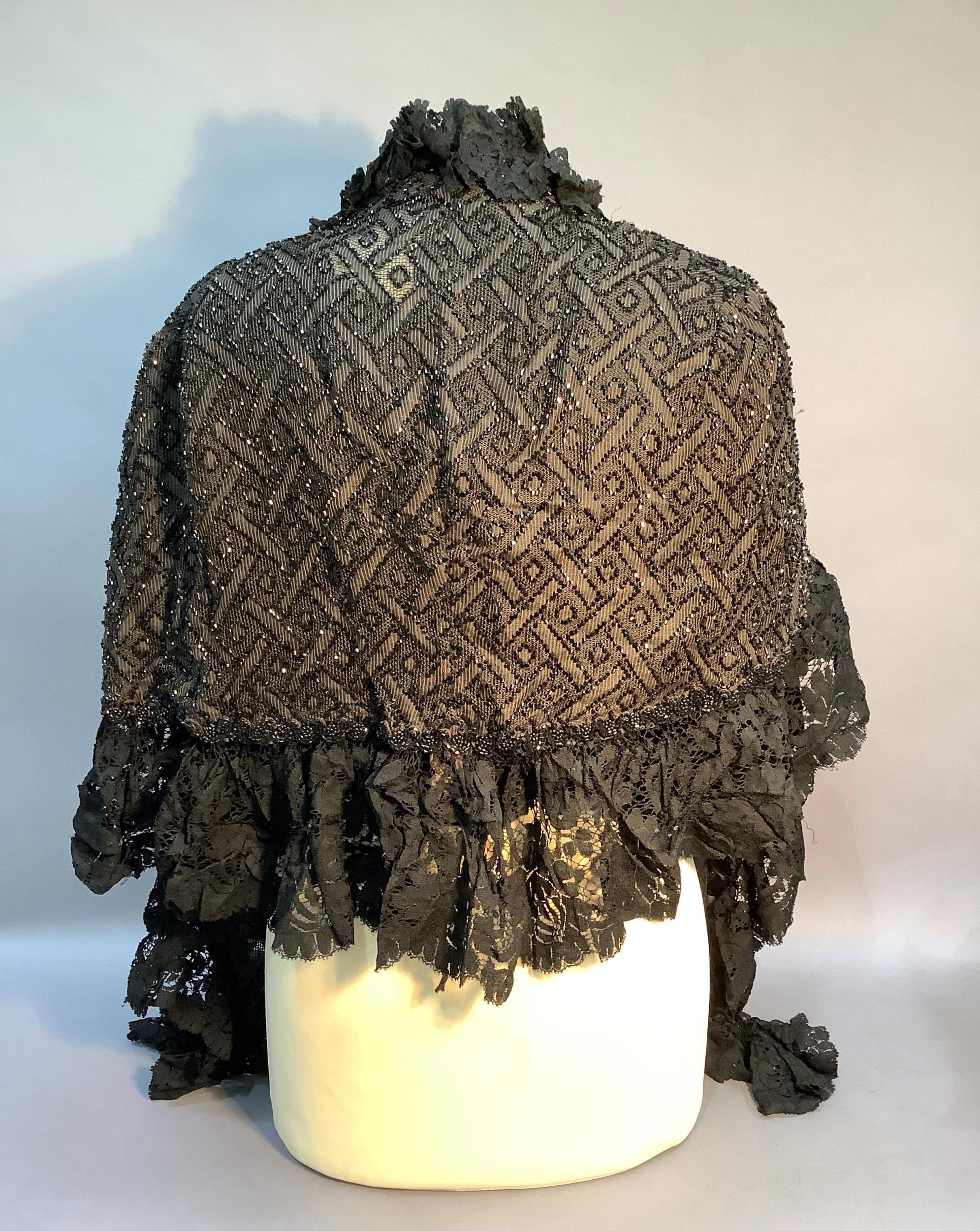 A Victorian dark brown and beaded cape with black lace trim together with a black ruched dress - Image 2 of 11