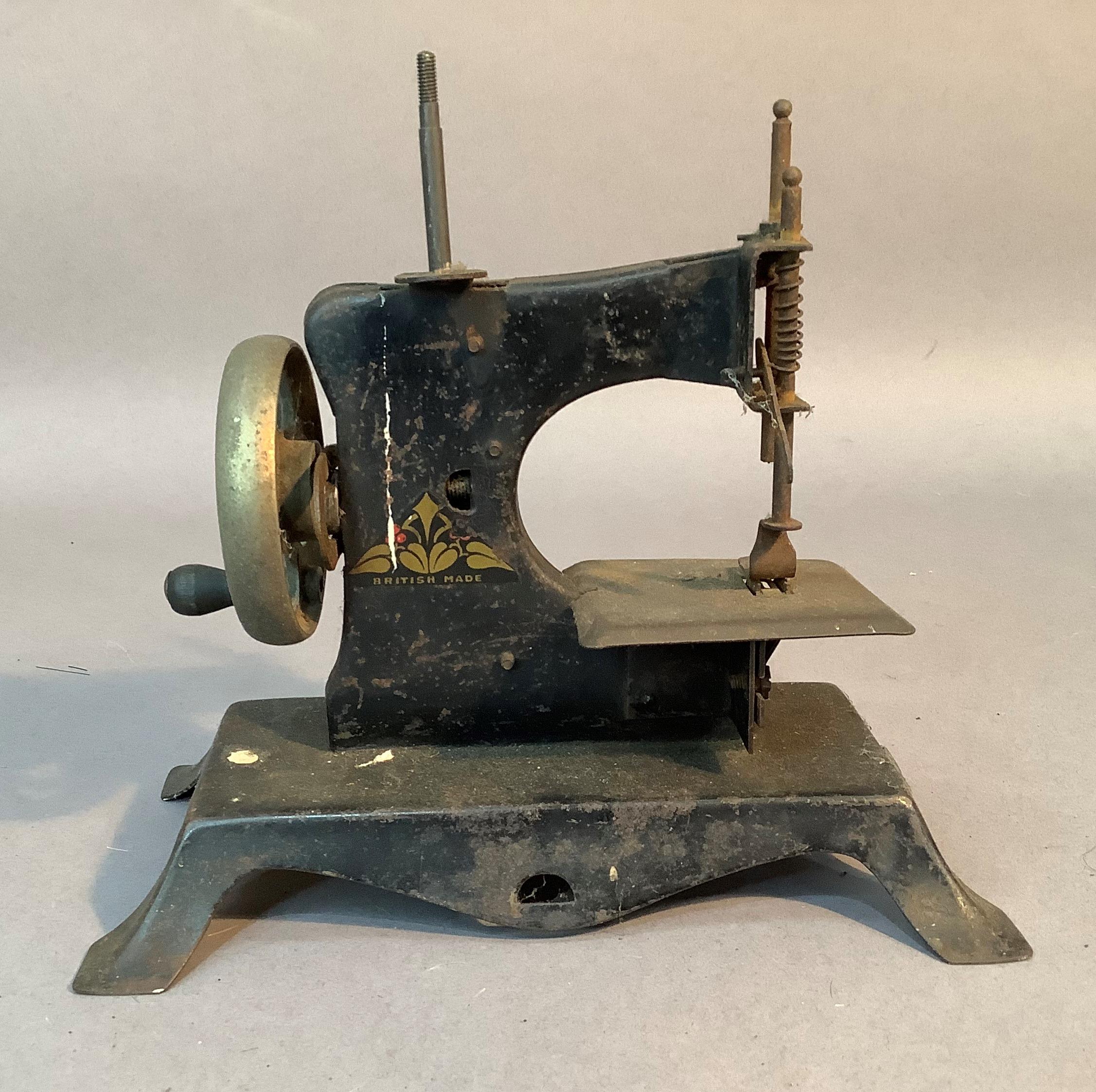 A Victorian black japanned toy sewing machine, 19cm high - Image 3 of 3