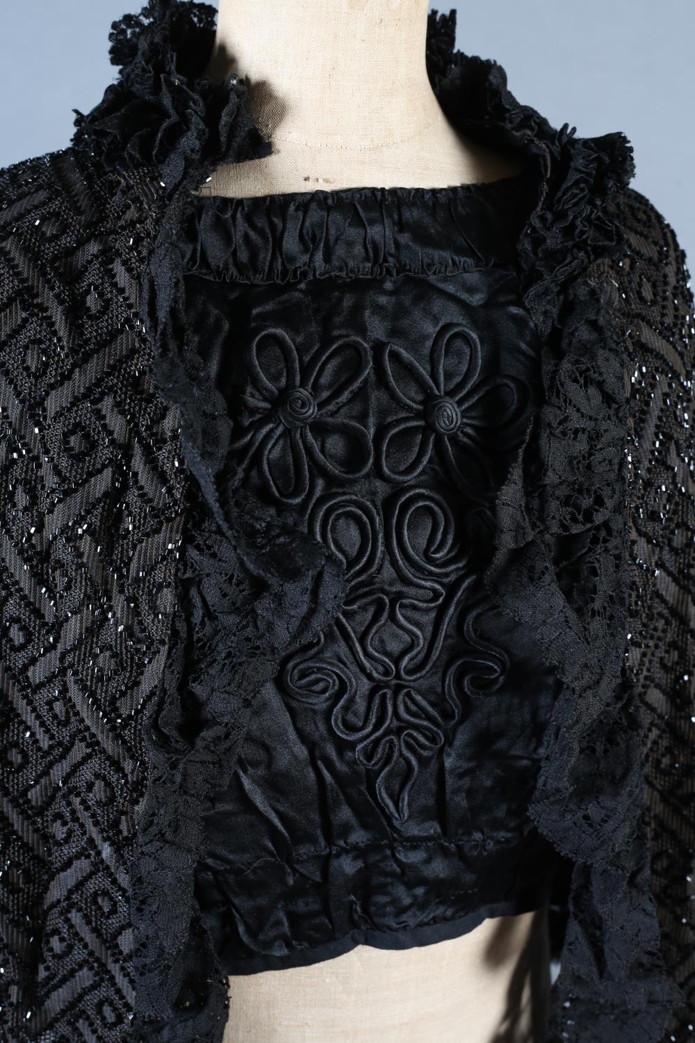 A Victorian dark brown and beaded cape with black lace trim together with a black ruched dress - Image 7 of 11