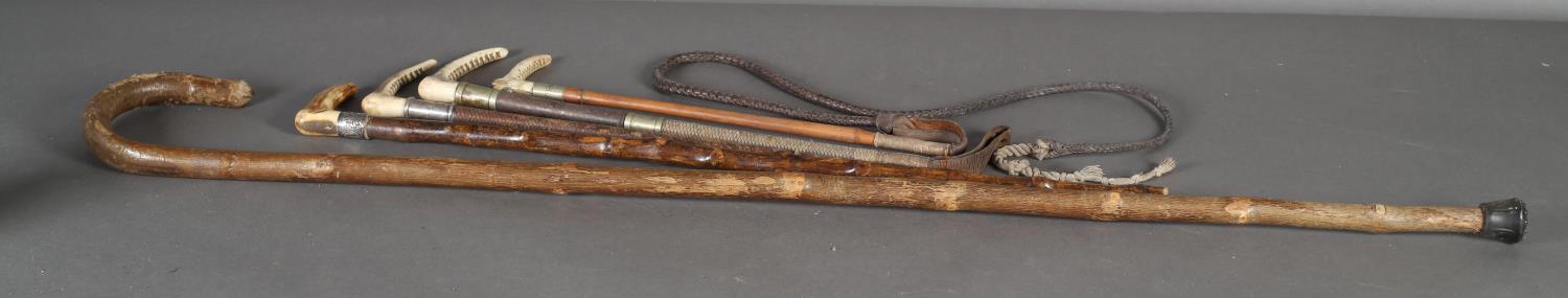 A riding crop with chequer carved antler handle, silver collar initialled B.H.S., woven leather