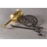 A Victorian brass meat jack and key together with a steel range arm and wheel