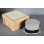 A Moss Bros of Covent Garden grey top hat with black felt band, Herbert Johnson Hatters box