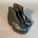 A pair of CC41 boy's hobnail ankle boots in black leather, the insole stamped BBM3 A212, black