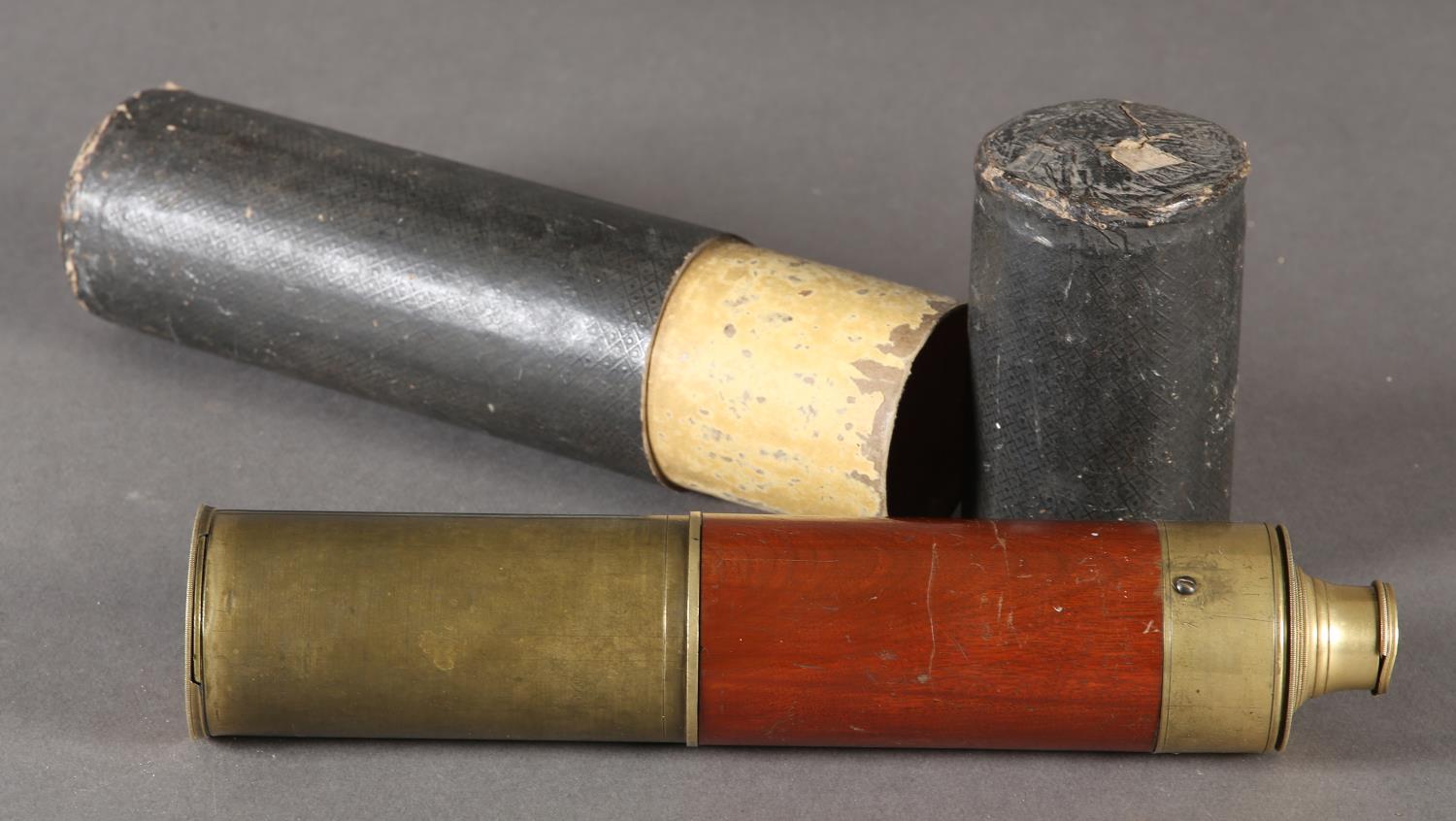 An early 20th century brass and mahogany three draw telescope, in case