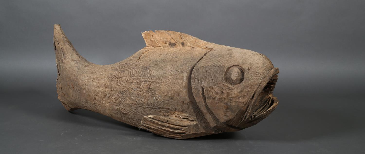 A large carved wooden fish with open mouth, approximate 120cm long