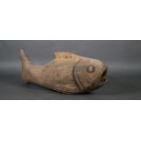A large carved wooden fish with open mouth, approximate 120cm long