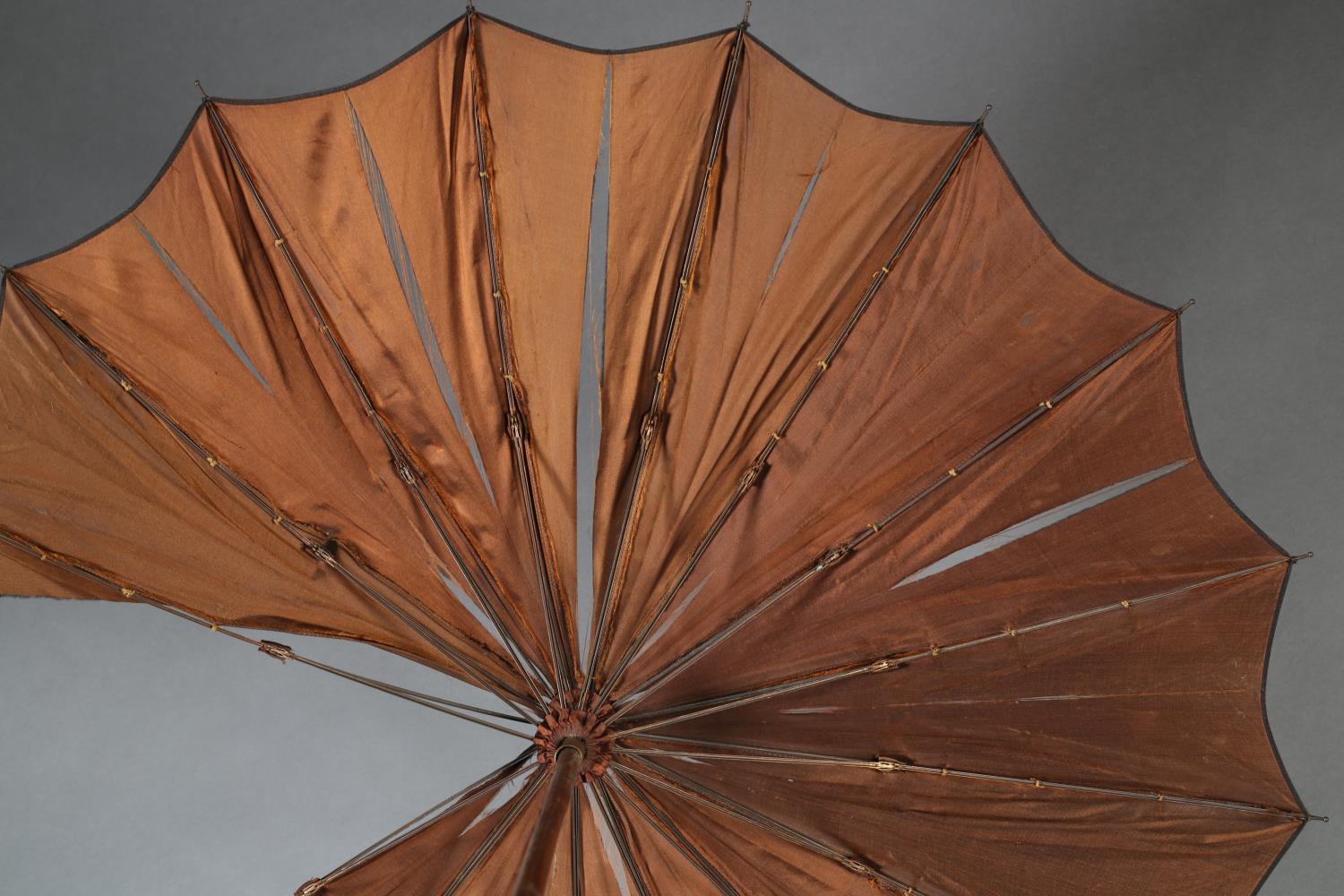 A Paragon & Sons black silk parasol with tapered pierced ebony handle ribbon carved, white metal - Image 5 of 6