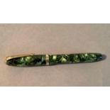 A Conway Stewart marbled green jade fountain pen, no. 84, 14ct 1st Quality nib, 11.5cm long