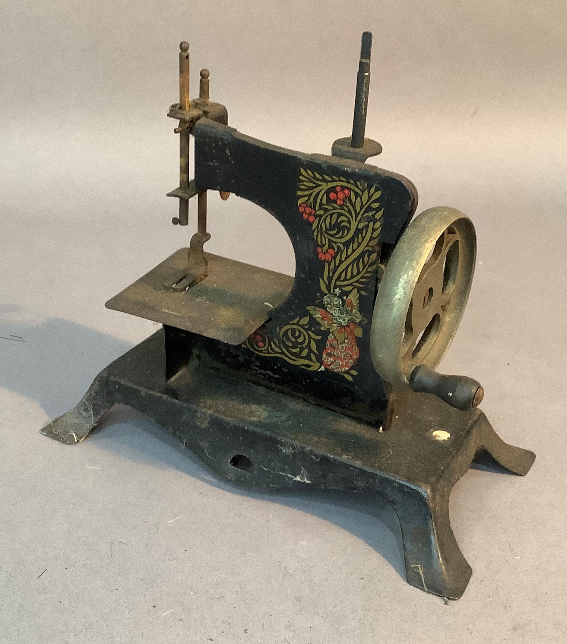 A Victorian black japanned toy sewing machine, 19cm high - Image 2 of 3