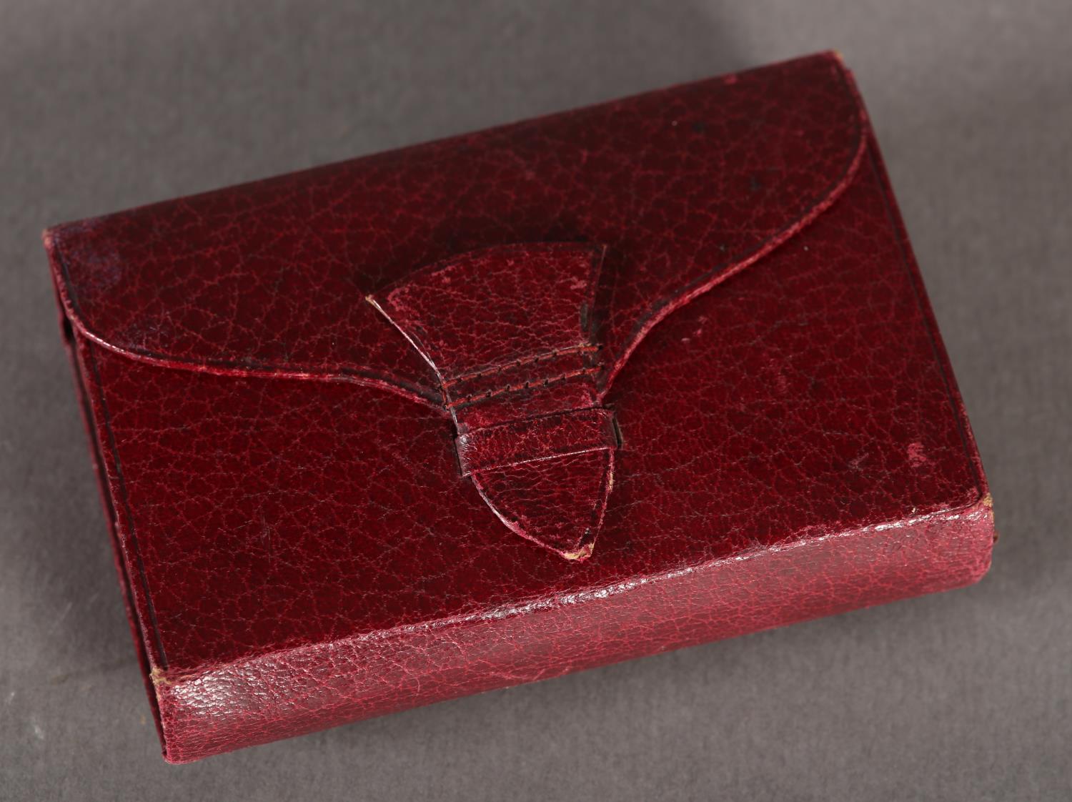 An Edwardian maroon leather needle wallet stamped in gilt Abel Morrall's Sewing Needles, - Image 3 of 3
