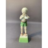 A Royal Worcester figure: Friday's child is loving and caring, 17.5cm high, printed mark in black
