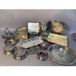Quantity of silver plated ware including coasters, pierced circular trays, oblong tray, two sets