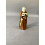 A Royal Worcester candle snuffer modelled as a monk, 12cm high, printed mark in puce