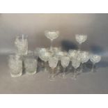 A part suite of hobnail cut table glass including five water glasses, five champagne coupes, six