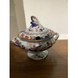 A 19th century Ironstone China two handled sauce tureen and domed cover with bud finial, printed and