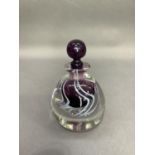 A David Wallace amethyst and white ribbon clear glass cased scent bottle of ovoid outline, etched